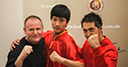 Si Fu Alan Paterson, Master Paul Hawkes and the martial arts performer from the London Confucius Institute of TCM at the Kung Fu Schools franchise launch